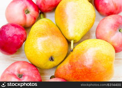 Photo of background with red apples and pears