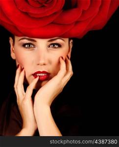 Photo of beautiful sexy woman with red rose hat on the head isolated on black background, closeup portrait of seductive woman with perfect makeup, Valentine day, beauty salon, fashion style