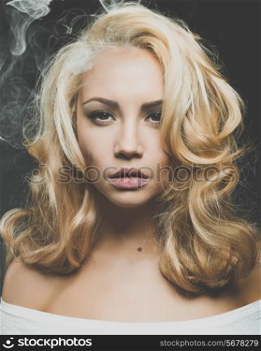 Photo of beautiful woman with magnificent blond hair