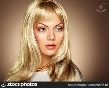 Photo of beautiful woman with magnificent hair. Fashion photo