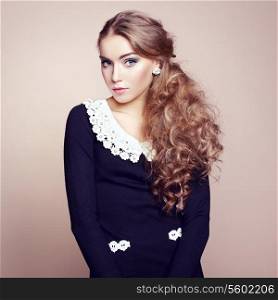 Photo of beautiful woman with magnificent hair. Perfect makeup. Fashion photo