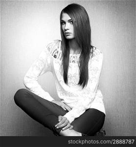 Photo of beautiful young woman in white jacket. Fashion photo