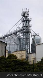 Photo of big factory and grain silos.