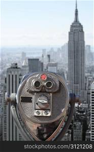 Photo of binoculars pointed at downtown Manhattan.