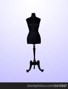 Photo of black mannequin isolated on a over blue background