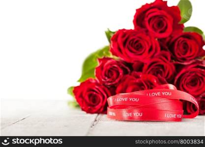 Photo of bouquet of red roses and ribbon