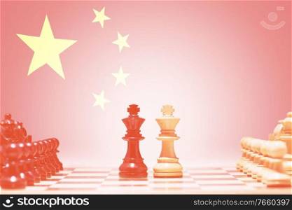 Photo of chess board game against chinese flag