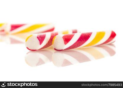 Photo of colorful candies over white isolated background
