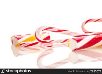 Photo of colorful candies over white isolated background