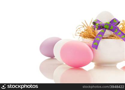 Photo of colorful easter eggs over white isolated background