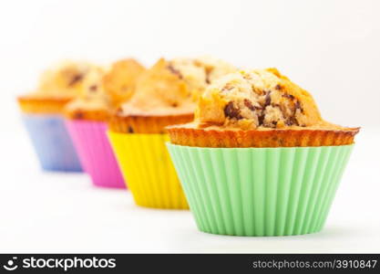 Photo of cupcakes over white isolated background