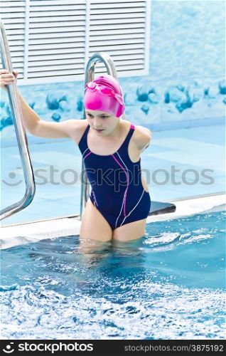 Photo of cute girl in swimming pool