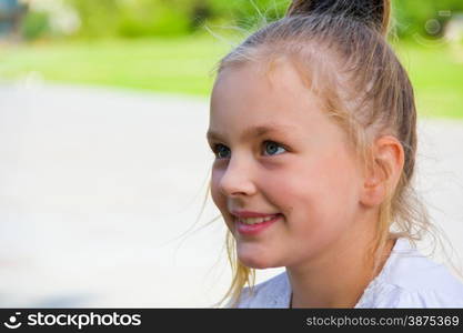 Photo of cute girl with big blue eyes