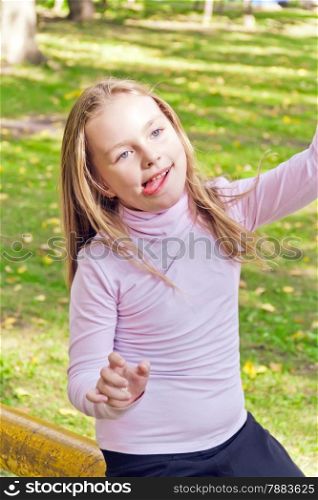 Photo of cute girl with put out tongue