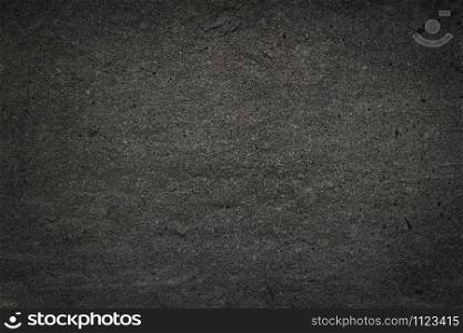 Photo of dark asphalted surface background