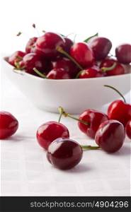 photo of delicious cherries on white isolated background