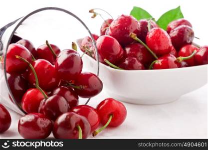 photo of delicious cherries on white isolated background