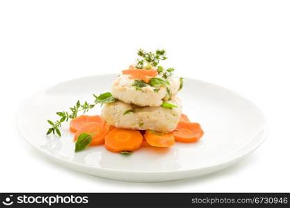 photo of delicious cod over carrots on isolated white background