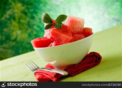 photo of delicious cutted watermelon inside a bowl