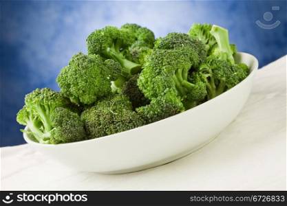 photo of delicious fresh green broccoli inside a bowl