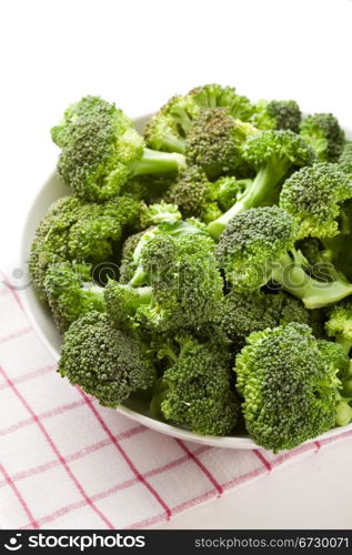 photo of delicious fresh green broccoli inside a bowl