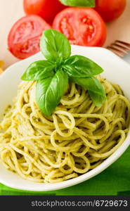 photo of delicious italian pasta with pesto sauce