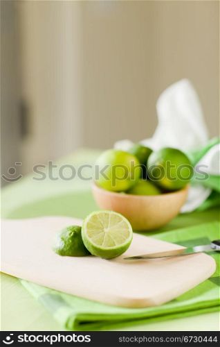 photo of delicious lime inside a bowl taken by daylight next to window