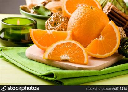 photo of delicious orange on cutting board