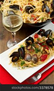 photo of delicious pasta with clams and mussel