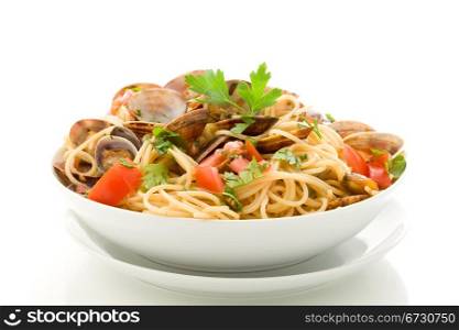 photo of delicious pasta with clams on white isolated background