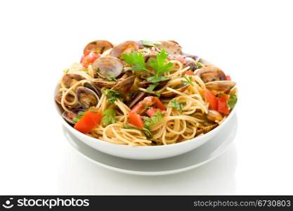 photo of delicious pasta with clams on white isolated background