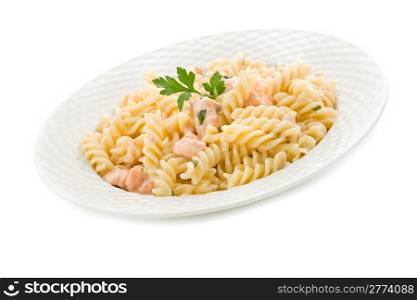 photo of delicious pasta with salmon and cream on white background