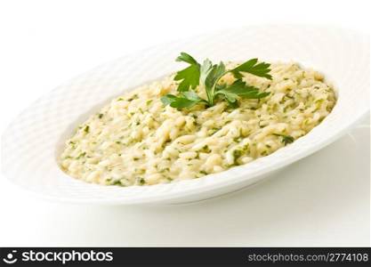photo of delicious risotto dish with herbs on white background