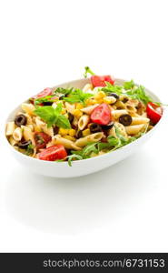 photo of delicious tasty pasta salad with fresh vegetables on isolated background