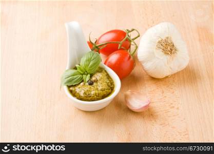 photo of different ingredients for preparing pesto sauce