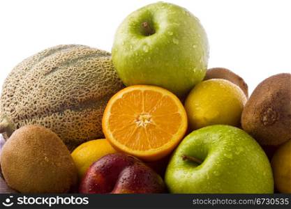 photo of different organic fruits with water drops