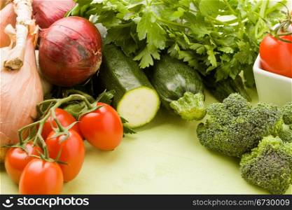 photo of different vegetables on green wooden table