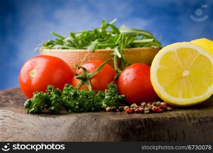 photo of different vegetables on wooden chopping board ready for cooking