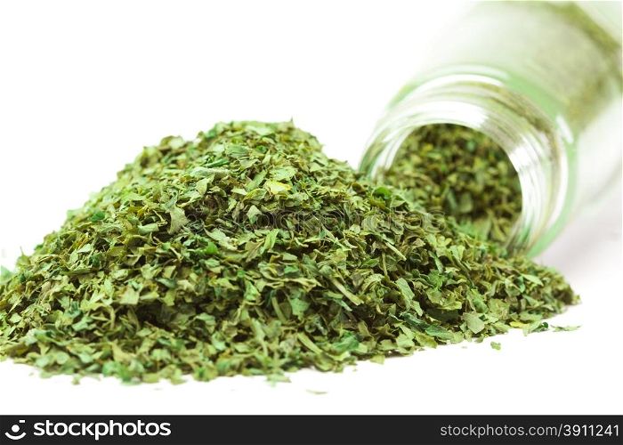 Photo of dried parsley over white background