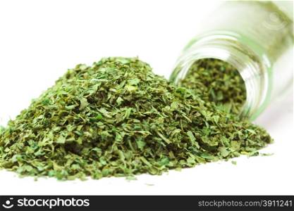 Photo of dried parsley over white background