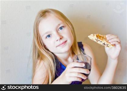 Photo of eating cute girl with blond hair