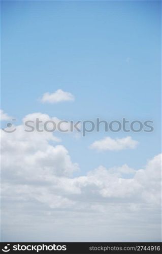 photo of enchanted clouds on light blue sky