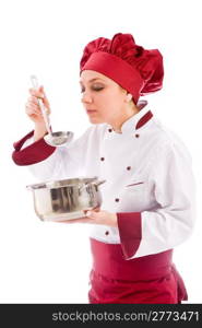 photo of female chef with pot who is tasting her food