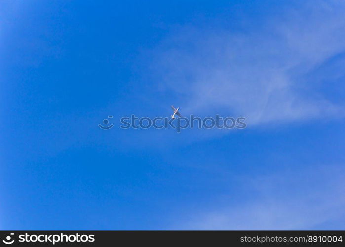 Photo of flying military airplane in blue sky