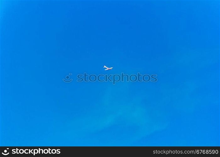 Photo of flying military plane in blue sky