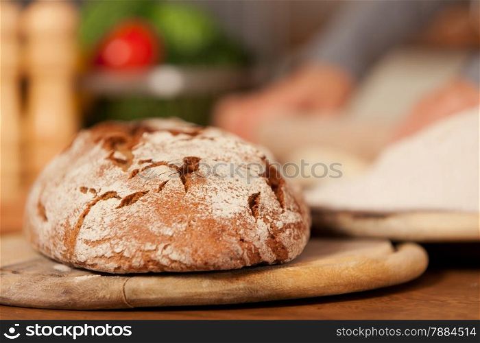 photo of fresh home made bread over wooden table
