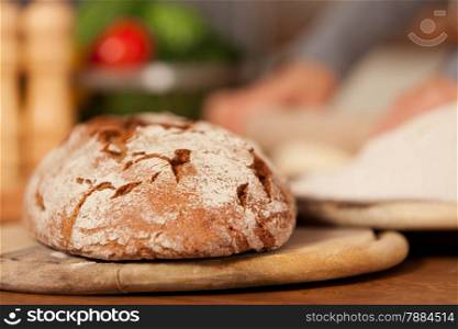 photo of fresh home made bread over wooden table
