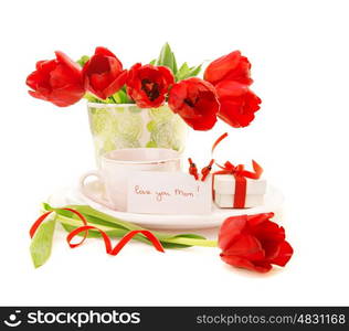 Photo of fresh red tulip flowers in vase and cup of coffee isolated on white background, morning beverage for dear mom, greeting postcard, mothers day, still life, gift box, love concept