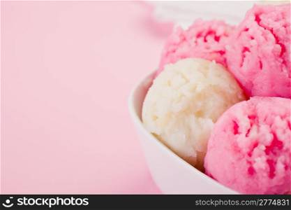 photo of fresh strawberry vanilla ice cream on a rose background