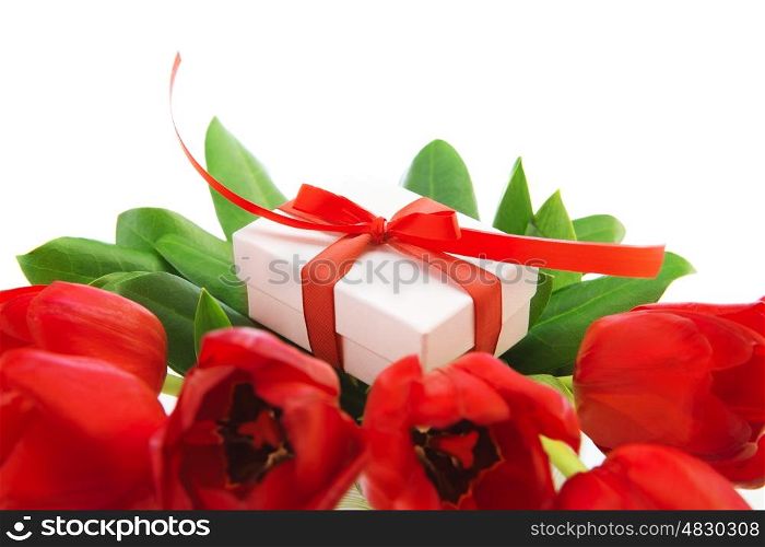 Photo of fresh tulip bouquet, little gift box for mom, festive still life, isolated on white background, happy mothers day, valentine day, present for birthday, love and romance concept&#xA;